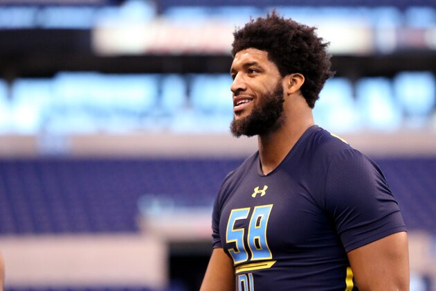 Arkansas defensive end Deatrich Wise is seen before a drill at the 2017 NFL football scouting combine Sunday, March 5, 2017, in Indianapolis. (AP Photo/Gregory Payan)