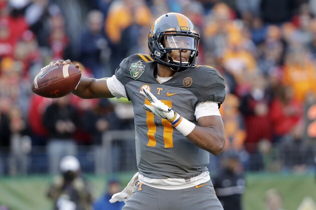 Tennessee quarterback Joshua Dobbs passes against Nebraska in the first half of the Music City Bowl NCAA college football game Friday, Dec. 30, 2016, in Nashville, Tenn. (AP Photo/Mark Humphrey) Tennessee quarterback Joshua Dobbs passes against Nebraska in the first half of the Music City Bowl NCAA college football game Friday, Dec. 30, 2016, in Nashville, Tenn. (AP Photo/Mark Humphrey)