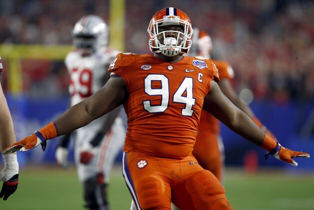 Clemson defensive tackle Carlos Watkins (94) celebrates a defensive stop against Ohio State during the first half of the Fiesta Bowl NCAA college football game, Saturday, Dec. 31, 2016, in Glendale, Ariz. (AP Photo/Ross D. Franklin)