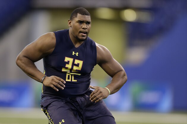 Kutztown offensive lineman Jordan Morgan runs a drill at the NFL football scouting combine in Indianapolis, Friday, March 3, 2017. (AP Photo/Michael Conroy)