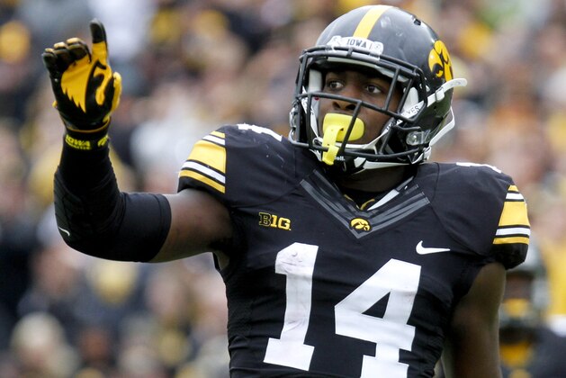IOWA CITY, IOWA- OCTOBER 1:  Defensive back Desmond King #14 of the Iowa Hawkeyes celebrates after breaking up a pass during the third quarter against the Northwestern Wildcats on October 1, 2016 at Kinnick Stadium in Iowa City, Iowa.  (Photo by Matthew Holst/Getty Images)