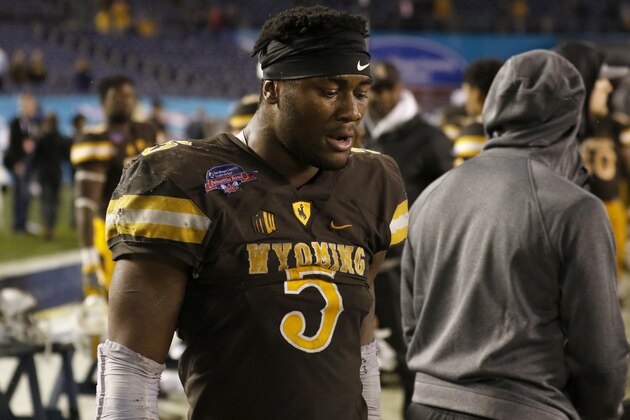 Wyoming running back Brian Hill is seen on the sideline during the second half of the Poinsettia Bowl NCAA college football game against BYU Wednesday, Dec. 21, 2016, in San Diego. BYU won 24-21. (AP Photo/Ryan Kang)