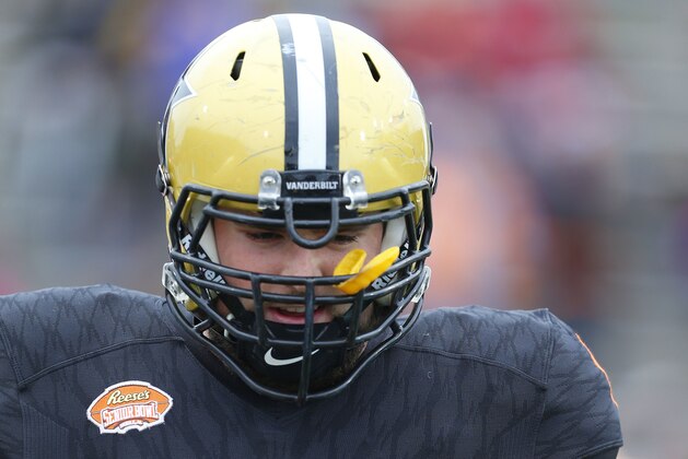 South squad Will Holden, of Vanderbilt, runs on the field during the player introductions of the Senior Bowl NCAA college football game, Saturday, Jan. 28, 2017, at Ladd-Peebles Stadium in Mobile, Ala. (AP Photo/Butch Dill)
