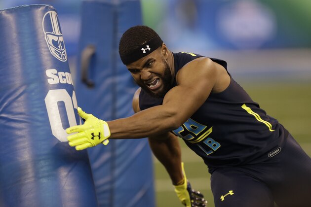 Northwestern linebacker Anthony Walker runs a drill at the NFL football scouting combine Sunday, March 5, 2017, in Indianapolis. (AP Photo/David J. Phillip)