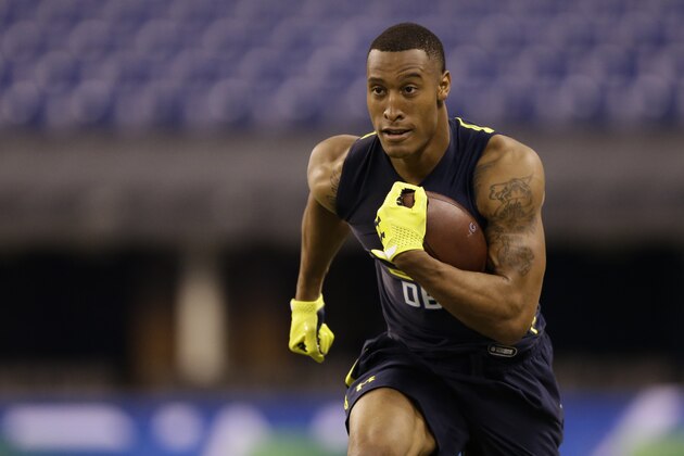 Utah defensive back Brian Allen runs a drill at the NFL football scouting combine in Indianapolis, Monday, March 6, 2017. (AP Photo/Michael Conroy)