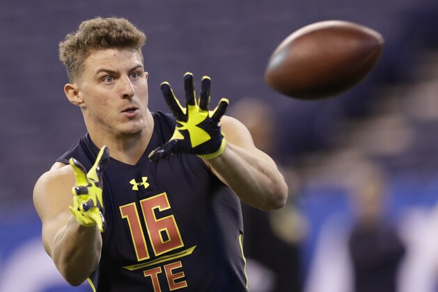Drake tight end Eric Saubert runs a drill at the NFL football scouting combine Saturday, March 4, 2017, in Indianapolis. (AP Photo/David J. Phillip)