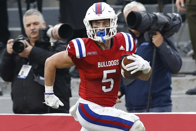 Louisiana Tech wide receiver Trent Taylor runs for a touchdown against Navy during first half of the Armed Forces Bowl NCAA college football game, Friday, Dec. 23, 2016, in Fort Worth, Texas. (AP Photo/Jim Cowsert)