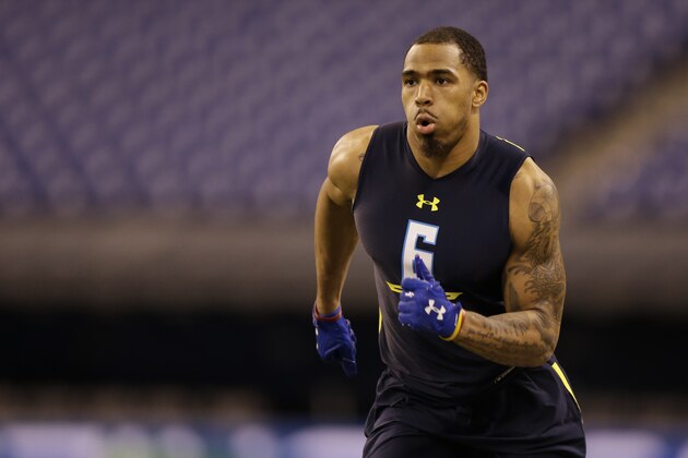 Virginia Tech defensive back Chuck Clark runs a drill at the NFL football scouting combine in Indianapolis, Monday, March 6, 2017. (AP Photo/Michael Conroy)