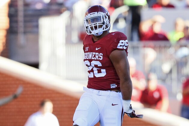 Oklahoma linebacker Jordan Evans (26) celebrates a tackle during an NCAA college football game between Louisiana Monroe and Oklahoma in Norman, Okla., Saturday, Sept. 10, 2016. (AP Photo/Sue Ogrocki)