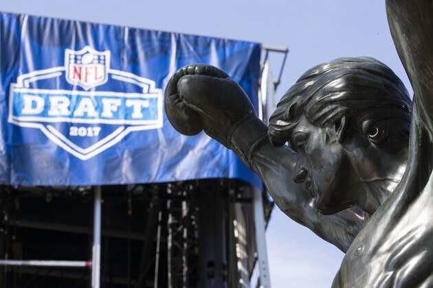 The Rocky statue stands in view of the stage being constructed for the upcoming 2017 NFL football draft on the steps of the Philadelphia Museum of Art in Philadelphia, Tuesday, April 18, 2017. When the NFL chose Philadelphia to host the 2017 draft, they insisted on holding the three-day event at the Art Museum in front of the iconic Rocky steps. Mayor Jim Kenney and city officials made it happen so construction crews are putting together a 3,000-seat theater for an extravaganza that's expected to draw about 200,000 people to the venue. (AP Photo/Matt Rourke)