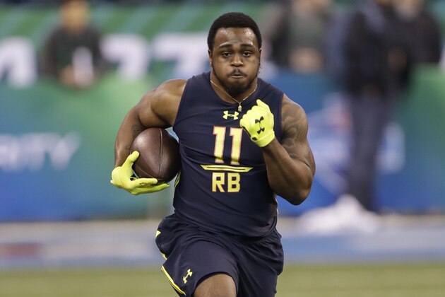 Coastal Carolina running back De'Angelo Henderson runs a drill at the NFL football scouting combine Friday, March 3, 2017, in Indianapolis. (AP Photo/David J. Phillip)