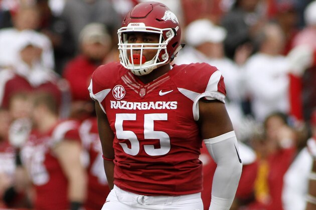 Arkansas' Jeremiah Ledbetter (55) celebrates after sacking Auburn's quarterback during the first half an NCAA college football game Saturday, Oct. 24, 2015, in Fayetteville, Ark. (AP Photo/Samantha Baker)