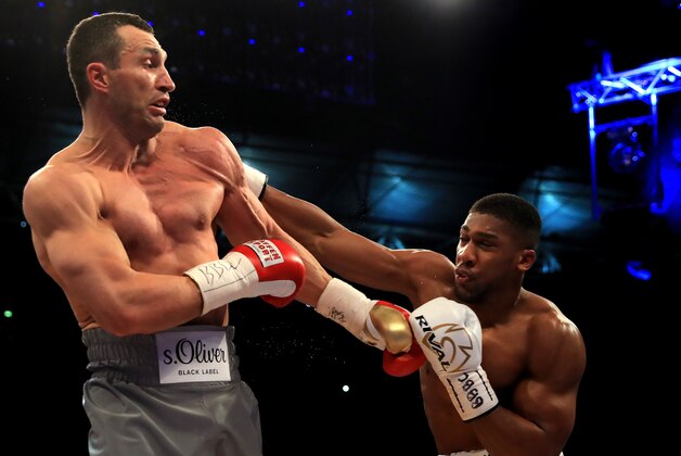 LONDON, ENGLAND - APRIL 29:  Anthony Joshua  (White Shorts) and Wladimir Klitschko (Gray Shorts)  in action during the IBF, WBA and IBO Heavyweight World Title bout at Wembley Stadium on April 29, 2017 in London, England.  (Photo by Richard Heathcote/Getty Images)