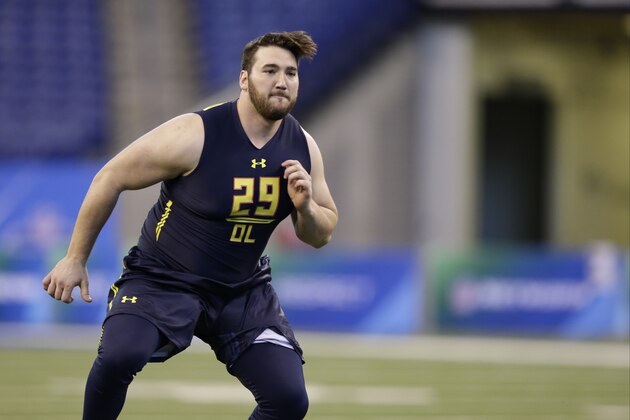 Tennessee Chattanooga offensive lineman Corey Levin runs a drill at the NFL football scouting combine in Indianapolis, Friday, March 3, 2017. (AP Photo/Michael Conroy)