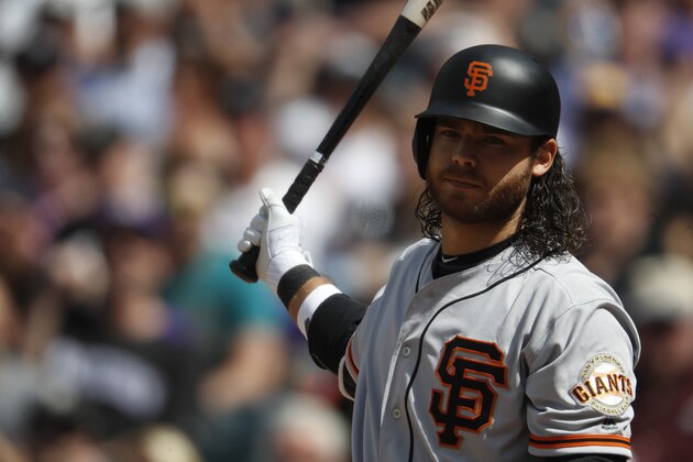 San Francisco Giants shortstop Brandon Crawford (35) in the sixth inning of a baseball game Sunday, April 23, 2017, in Denver. Colorado won 8-0. (AP Photo/David Zalubowski)