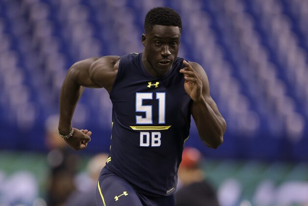 North Carolina State defensive back Jack Tocho runs the 40-yard dash at the NFL football scouting combine in Indianapolis, Monday, March 6, 2017. (AP Photo/Michael Conroy)