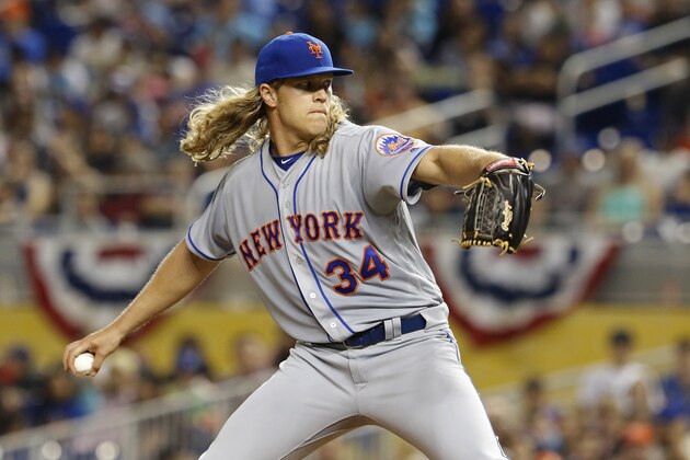 MIAMI, FL - APRIL 14:   Noah Syndergaard #34 of the New York Mets throws in the first inning against the Miami Marlins at Marlins Park on April 14, 2017 in Miami, Florida. (Photo by Joe Skipper/Getty Images)