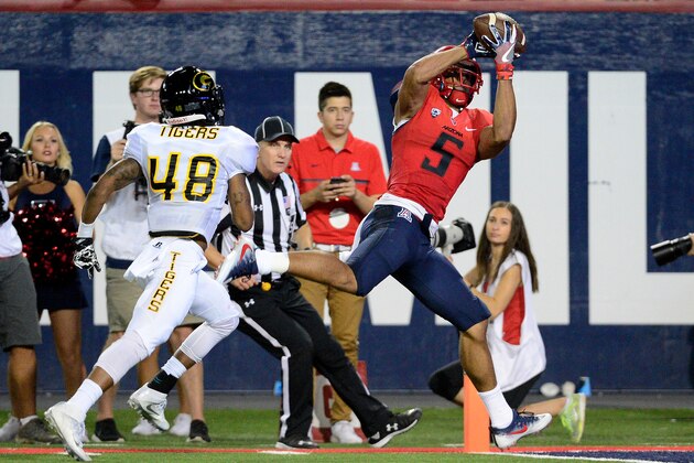 TUCSON, AZ - SEPTEMBER 10:  Wide receiver Trey Griffey #5 of the Arizona Wildcats catches the ball in front of defensive back Jaterious Pouncey #48 of the Grambling State Tigers for a 34 yard touchdown in the third quarter at Arizona Stadium on September 10, 2016 in Tucson, Arizona.  (Photo by Jennifer Stewart/Getty Images)