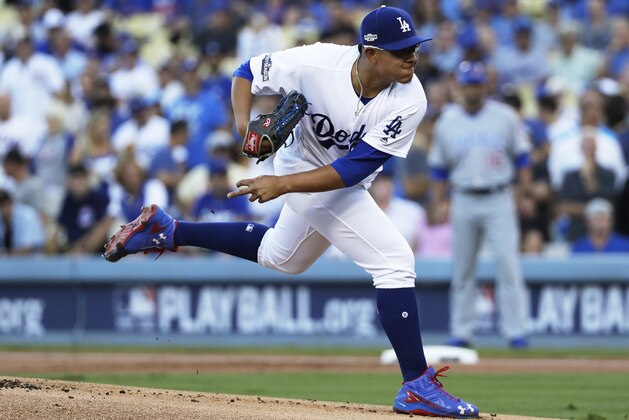 Los Angeles Dodgers starting pitcher Julio Urias throws during the first inning of Game 4 of the National League baseball championship series against the Chicago Cubs Wednesday, Oct. 19, 2016, in Los Angeles. (AP Photo/David J. Phillip)