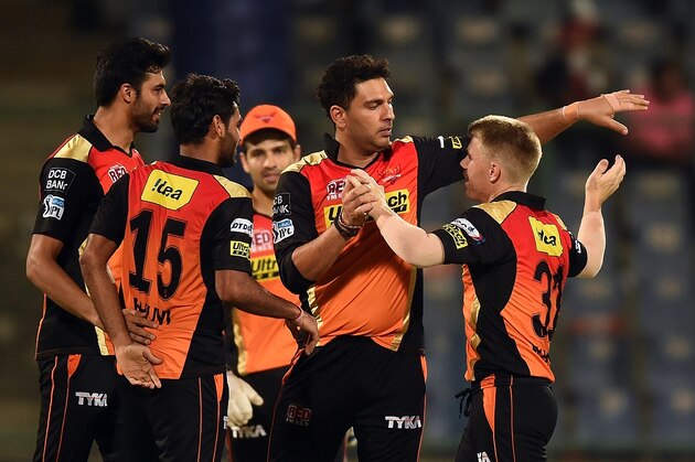 Sunrisers Hyderabad captain David Warner (R) celebrates the victory over Kolkata Knight Riders with teammates  during the 2016 Indian Premier League (IPL) Twenty20 eliminator cricket match between Kolkata Knight Riders and Sunrisers Hyderabad at the Feroz Shah Kotla Cricket Stadium in New Delhi on May 25, 2016. / AFP / PRAKASH SINGH        (Photo credit should read PRAKASH SINGH/AFP/Getty Images)