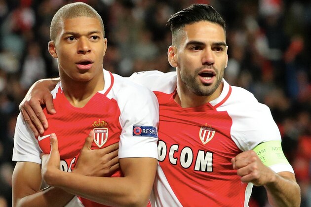 MONACO, MONACO - APRIL 19:  Kylian Mbappe of AS Monaco celebrates his goal with captain Radamel Falcao during the UEFA Champions League Quarter Final second leg between AS Monaco and Borussia Dortmund at Stade Louis II on April 19, 2017 in Monaco, Monaco.  (Photo by Xavier Laine/Getty Images )