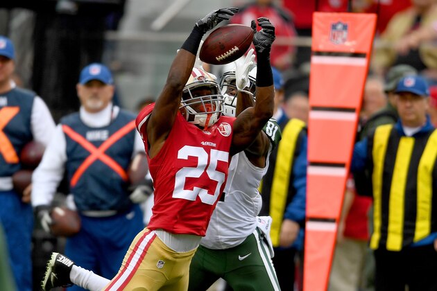 SANTA CLARA, CA - DECEMBER 11:  Jimmie Ward #25 of the San Francisco 49ers intercepts a pass intended for Quincy Enunwa #81 of the New York Jets in the first quarter their NFL football game at Levi's Stadium on December 11, 2016 in Santa Clara, California.  (Photo by Thearon W. Henderson/Getty Images)