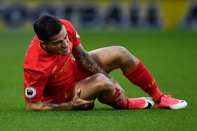 WATFORD, ENGLAND - MAY 01:  Philippe Coutinho of Liverpool goes down injured during the Premier League match between Watford and Liverpool at Vicarage Road on May 1, 2017 in Watford, England.  (Photo by Dan Mullan/Getty Images)