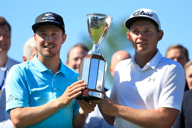 AVONDALE, LA - MAY 01:  Jonas Blixt of Sweden and Cameron Smith of Australia pose with the trophy after winning in a sudden-death playoff during a continuation of the final round of the Zurich Classic at TPC Louisiana on May 1, 2017 in Avondale, Louisiana.  (Photo by Marianna Massey/Getty Images)