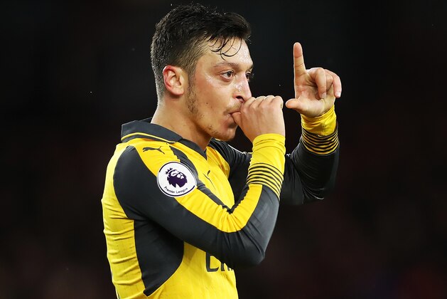 MIDDLESBROUGH, ENGLAND - APRIL 17:  Mesut Ozil of Arsenal reacts after he scores during the Premier League match between Middlesbourgh and Arsenal at Riverside Stadium on April 17, 2017 in Middlesbrough, England. (Photo by Ian MacNicol/Getty Images)