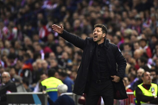 Atletico Madrid's Argentinian coach Diego Simeone gestures on the sideline during the Spanish league football match Club Atletico de Madrid vs Villarreal CF at the Vicente Calderon stadium in Madrid on April 25, 2017. / AFP PHOTO / PIERRE-PHILIPPE MARCOU        (Photo credit should read PIERRE-PHILIPPE MARCOU/AFP/Getty Images)
