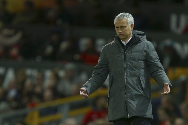 Manchester United's manager Jose Mourinho holds his arms out as he watches during the Europa League quarterfinal second leg soccer match between Manchester United and Anderlecht at Old Trafford stadium, in Manchester, England, Thursday, April 20, 2017. (AP Photo/Dave Thompson)