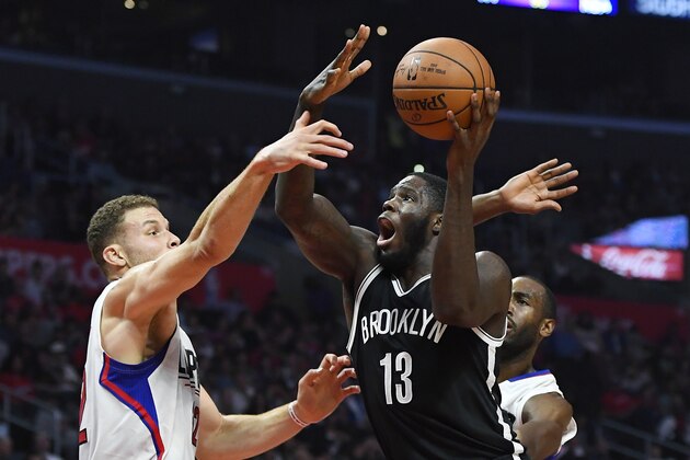 Brooklyn Nets forward Anthony Bennett, right, shoots as Los Angeles Clippers forward Blake Griffin defends during the first half of an NBA basketball game, Monday, Nov. 14, 2016, in Los Angeles. (AP Photo/Mark J. Terrill)