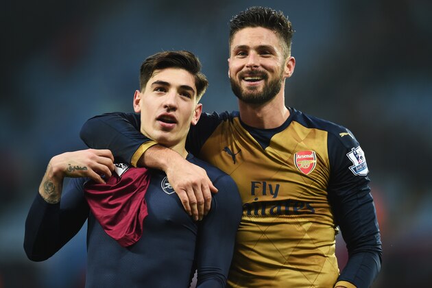 BIRMINGHAM, ENGLAND - DECEMBER 13:  Olivier Giroud and Hector Bellerin of Arsenal celebrate victory after the Barclays Premier League match between Aston Villa and Arsenal at Villa Park on December 13, 2015 in Birmingham, England.  (Photo by Michael Regan/Getty Images)