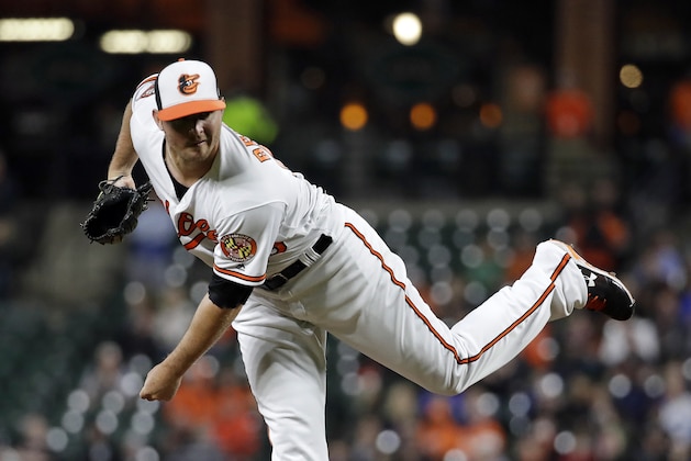Baltimore Orioles reliever Zach Britton follows through on a pitch to the Toronto Blue Jays during the ninth inning of a baseball game in Baltimore, Wednesday, April 5, 2017. Baltimore won 3-1. (AP Photo/Patrick Semansky)