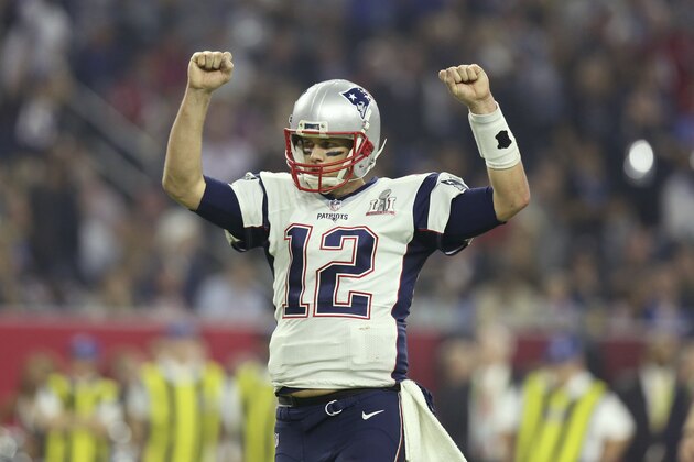 New England Patriots QB Tom Brady #12 celebrates a touchdown against the Atlanta Falcons at Super Bowl 51 on Sunday, February 5, 2017 in Houston, TX. (AP Photo/Gregory Payan)