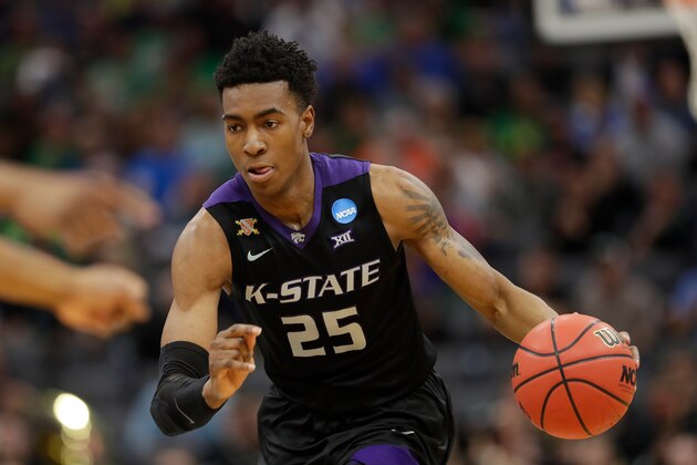 SACRAMENTO, CA - MARCH 17: Wesley Iwundu #25 of the Kansas State Wildcats handles the ball on offense against the Cincinnati Bearcats during the first round of the 2017 NCAA Men's Basketball Tournament at Golden 1 Center on March 17, 2017 in Sacramento, California.  (Photo by Jamie Squire/Getty Images)