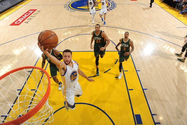 OAKLAND, CA - MAY 2:  Stephen Curry #30 of the Golden State Warriors goes up for a lay up against the Utah Jazz during Game One of the Western Conference Semifinals of the 2017 NBA Playoffs on May 2, 2017 at ORACLE Arena in Oakland, California. NOTE TO USER: User expressly acknowledges and agrees that, by downloading and/or using this photograph, user is consenting to the terms and conditions of Getty Images License Agreement. Mandatory Copyright Notice: Copyright 2017 NBAE (Photo by Andrew D. Bernstein/NBAE via Getty Images)