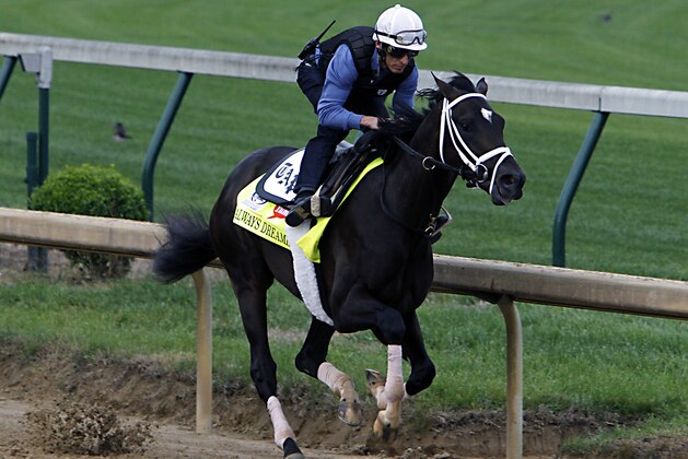 Kentucky Derby hopeful Always Dreaming works out under jockey John Velazquez at Churchill Downs in Louisville, Ky., Friday, April 28, 2017. Always Dreaming is one of five colts eyeing the May 6th horse race from the barn of trainer Todd Pletcher. (AP Photo/Garry Jones)