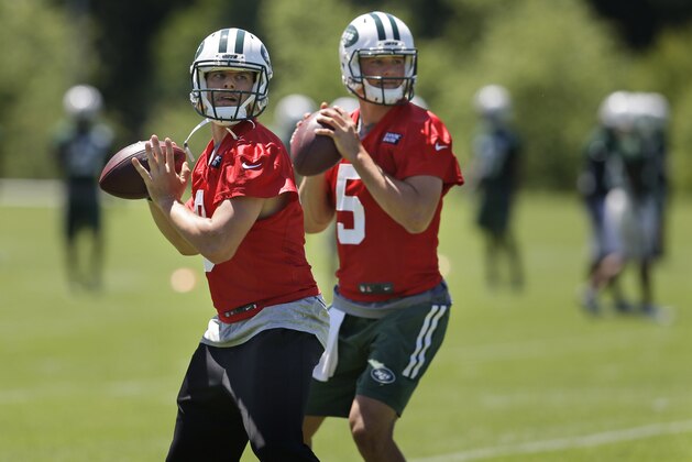 New York Jets quarterbacks Bryce Petty, left, and Christian Hackenberg look to throw during NFL football practice in Florham Park, N.J., Wednesday, June 15, 2016. (AP Photo/Seth Wenig) New York Jets quarterbacks Bryce Petty, left, and Christian Hackenberg look to throw during NFL football practice in Florham Park, N.J., Wednesday, June 15, 2016. (AP Photo/Seth Wenig)