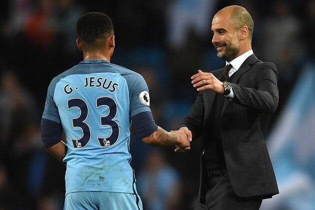 MANCHESTER, ENGLAND - APRIL 27:  Gabriel Jesus of Manchester City and Josep Guardiola, Manager of Manchester City speak after the full time whistle during the Premier League match between Manchester City and Manchester United at Etihad Stadium on April 27, 2017 in Manchester, England.  (Photo by Laurence Griffiths/Getty Images)