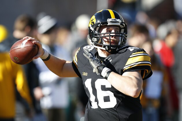 Iowa quarterback C.J. Beathard warms up before an NCAA college football game against Wisconsin, Saturday, Oct. 22, 2016, in Iowa City, Iowa. (AP Photo/Charlie Neibergall)