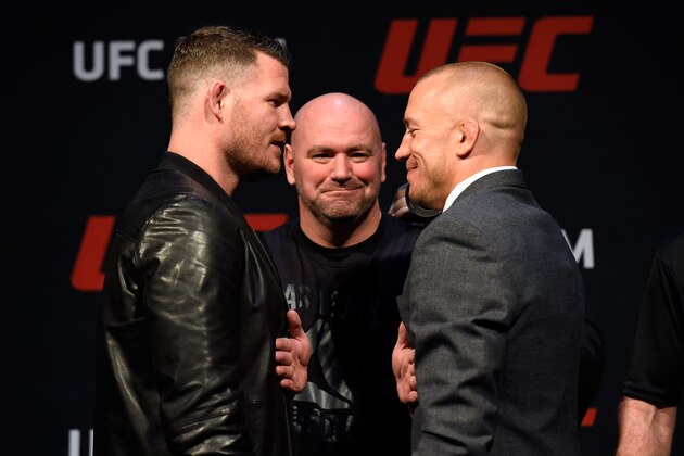 LAS VEGAS, NV - MARCH 03:  (L-R) UFC middleweight champion Michael Bisping of England faces off against Georges St-Pierre of Canada during the UFC press conference at T-Mobile arena on March 3, 2017 in Las Vegas, Nevada. (Photo by Josh Hedges/Zuffa LLC/Zuffa LLC via Getty Images)