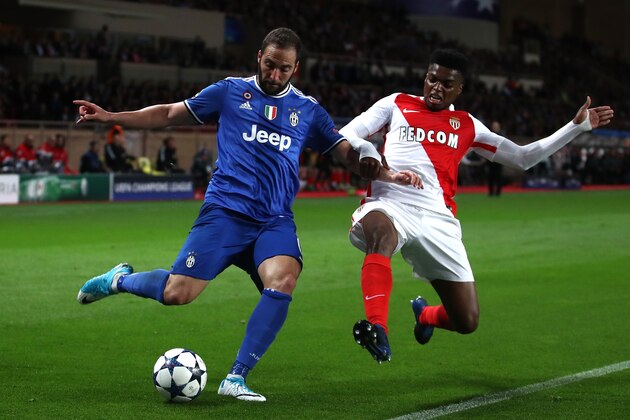 MONACO - MAY 03:  Jemerson of AS Monaco tackles Gonzalo Higuain of Juventus  during the UEFA Champions League Semi Final first leg match between AS Monaco v Juventus at Stade Louis II on May 3, 2017 in Monaco, Monaco.  (Photo by Julian Finney/Getty Images)