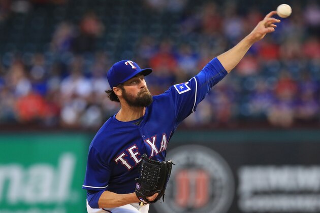 ARLINGTON, TX - APRIL 21:  Cole Hamels #35 of the Texas Rangers throws against the Kansas City Royals in the first inning at Globe Life Park in Arlington on April 21, 2017 in Arlington, Texas.  (Photo by Ronald Martinez/Getty Images)