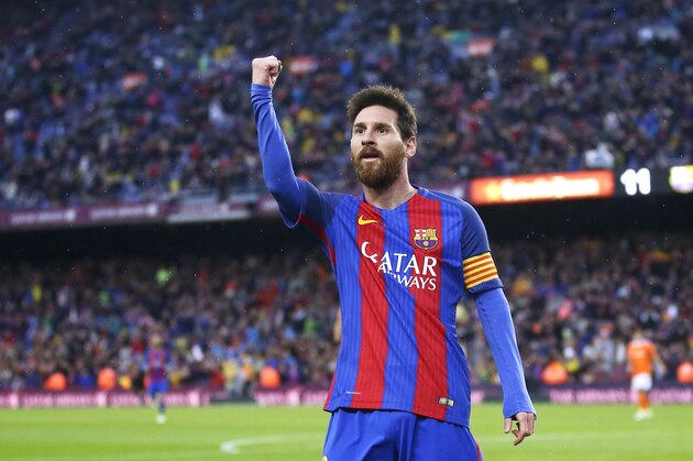 FC Barcelona's Lionel Messi celebrates after scoring during the Spanish La Liga soccer match between FC Barcelona and Osasuna at the Camp Nou stadium in Barcelona, Spain, Wednesday, April 26, 2017. (AP Photo/Manu Fernandez)