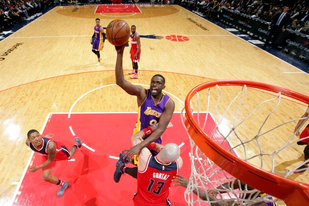 WASHINGTON, DC - FEBRUARY 2:  Luol Deng #9 of the Los Angeles Lakers goes up for a shot during a game against the Washington Wizards on February 2, 2017 at Verizon Center in Washington, DC. NOTE TO USER: User expressly acknowledges and agrees that, by downloading and or using this Photograph, user is consenting to the terms and conditions of the Getty Images License Agreement. Mandatory Copyright Notice: Copyright 2017 NBAE (Photo by Ned Dishman/NBAE via Getty Images)