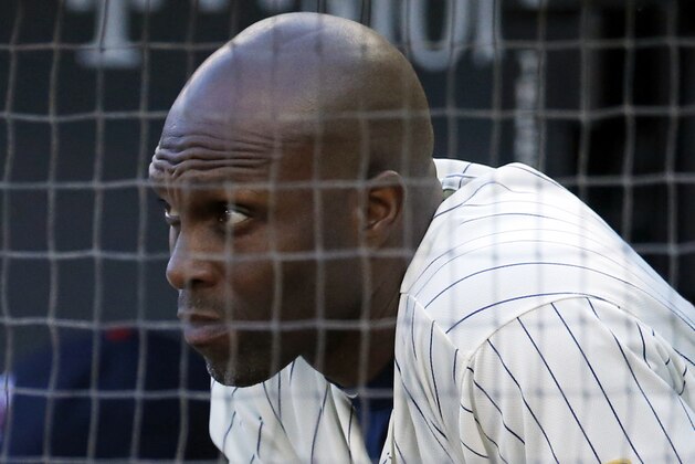 Minnesota Twins’ Torii Hunter watches from the dugout during the eighth inning of a baseball game against the Kansas City Royals, Saturday, Oct. 3, 2015, in Minneapolis. The Twins were eliminated from the AL wild-card race after losing 5-1 loss to Royals.  (AP Photo/Jim Mone)