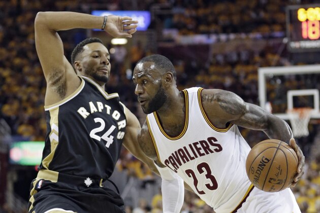 Cleveland Cavaliers' LeBron James (23) drives against Toronto Raptors' Norman Powell (24) duringd s*  the first half in Game 2 of a second-round NBA basketball playoff series, Wednesday, May 3, 2017, in Cleveland. The Cavaliers won 125-103. (AP Photo/Tony Dejak)