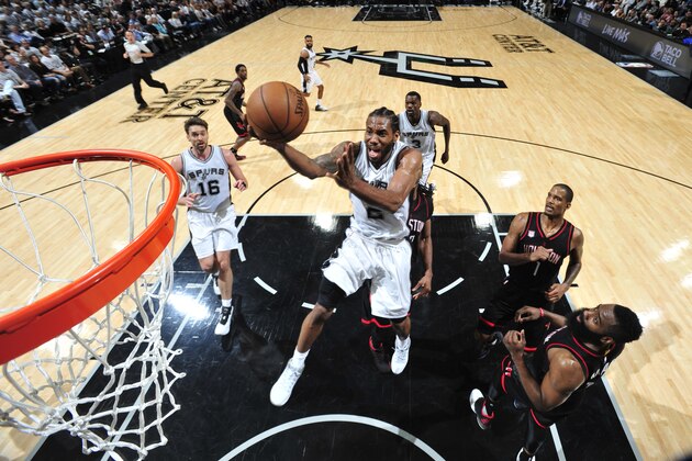 SAN ANTONIO, TX - MAY 1:  Kawhi Leonard #2 of the San Antonio Spurs goes up for a shot against the Houston Rockets during Game One of the Western Conference Semifinals of the 2017 NBA Playoffs on May 1, 2017 at AT&T Center in San Antonio, Texas. NOTE TO USER: User expressly acknowledges and agrees that, by downloading and/or using this photograph, user is consenting to the terms and conditions of the Getty Images License Agreement. Mandatory Copyright Notice: Copyright 2017 NBAE (Photo by Mark Sobhani/NBAE via Getty Images)