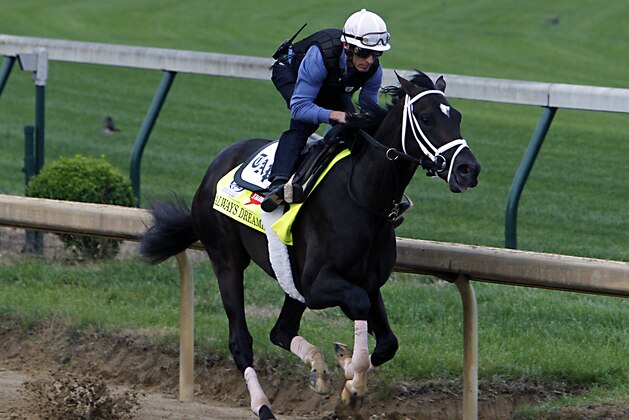 Kentucky Derby hopeful Always Dreaming works out under jockey John Velazquez at Churchill Downs in Louisville, Ky., Friday, April 28, 2017. Always Dreaming is one of five colts eyeing the May 6th horse race from the barn of trainer Todd Pletcher. (AP Photo/Garry Jones)